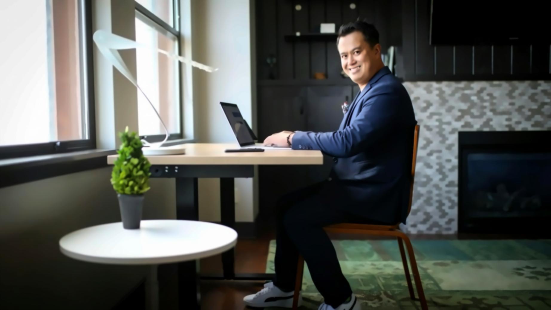 Organized desk setup showing financial analysis workspace with charts, calculator, and digital learning tools