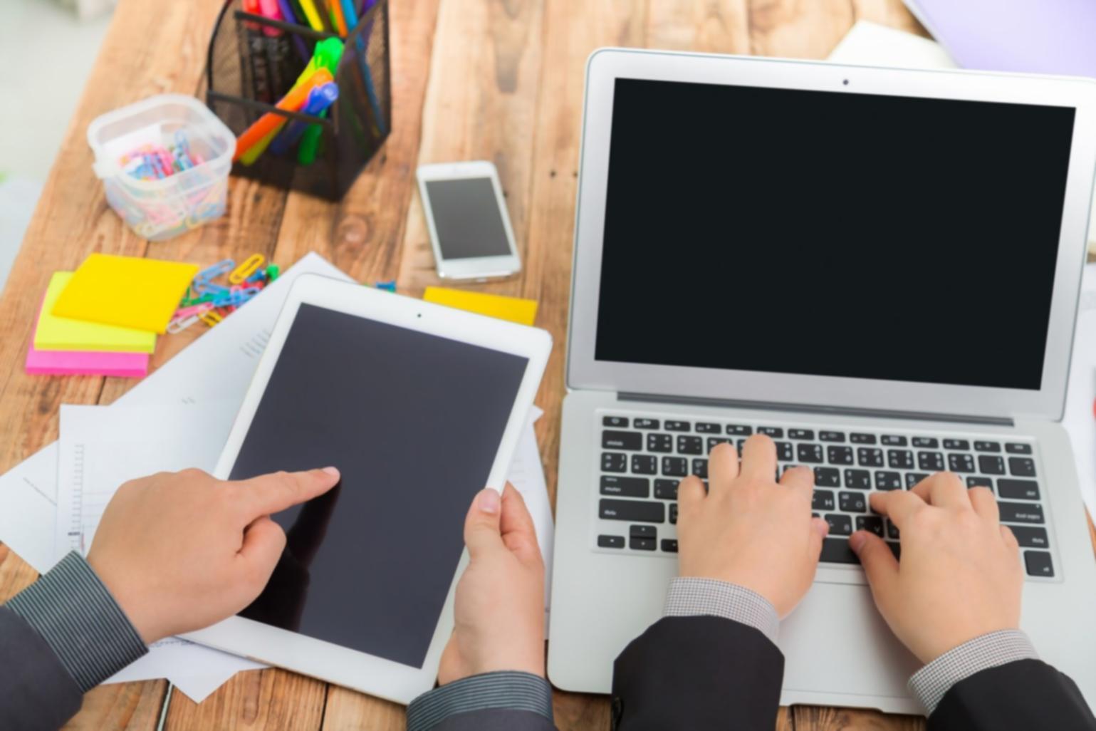 Professional workspace with financial modeling tools and calculation frameworks