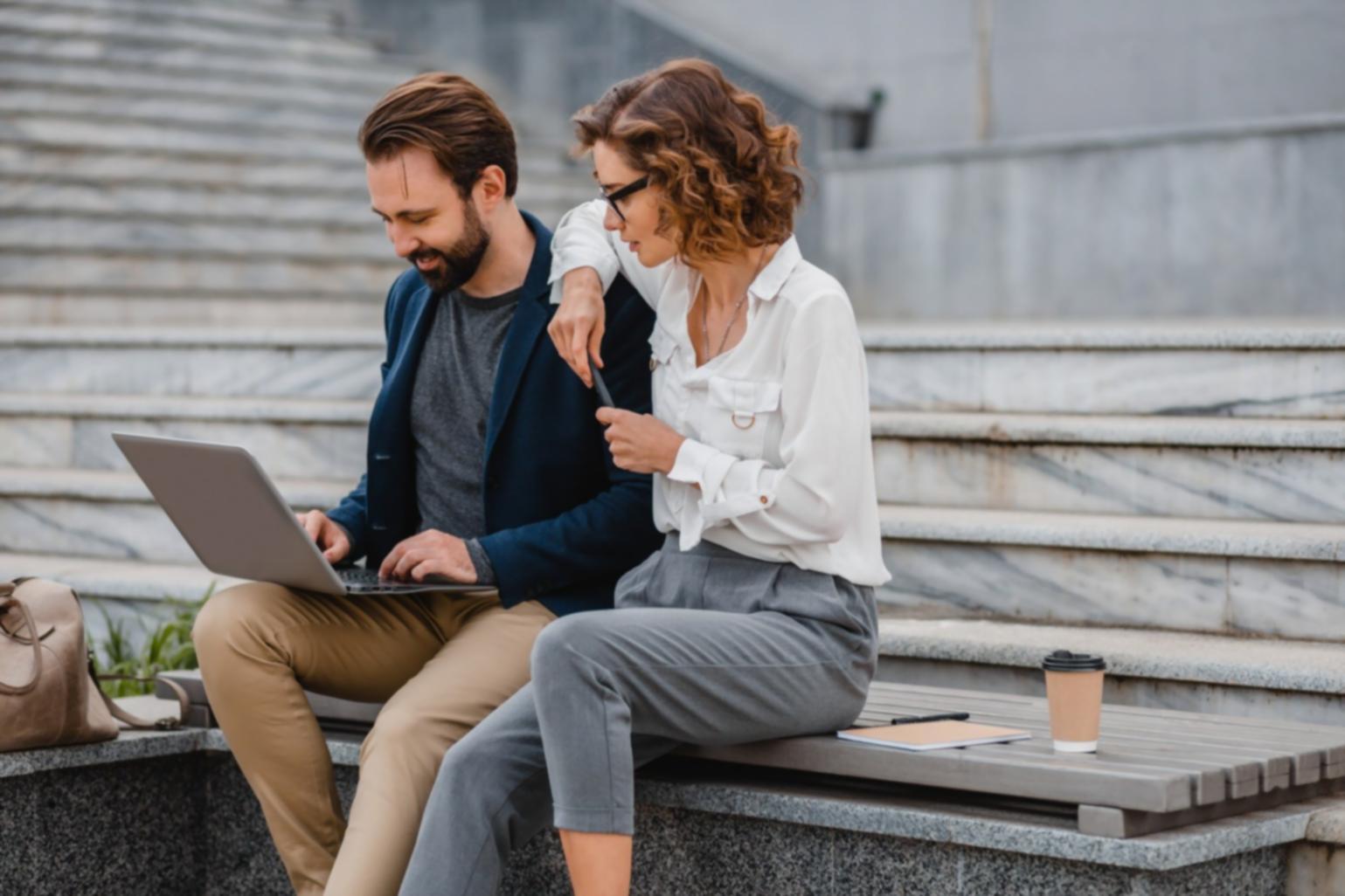 Financial analysis workspace with charts, calculators, and spreadsheets showing real business data analysis